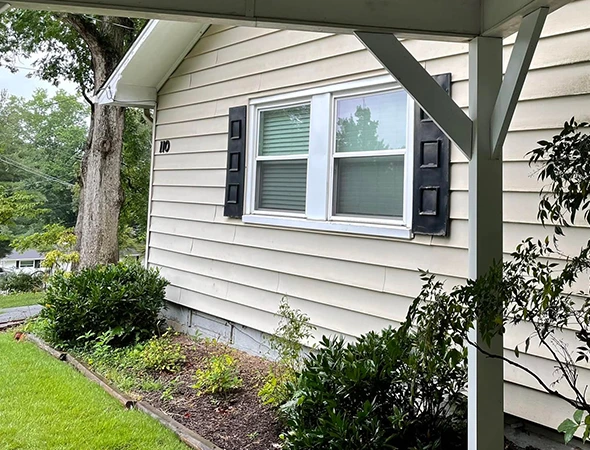 Professional team applying durable paint to residential interiors and exteriors