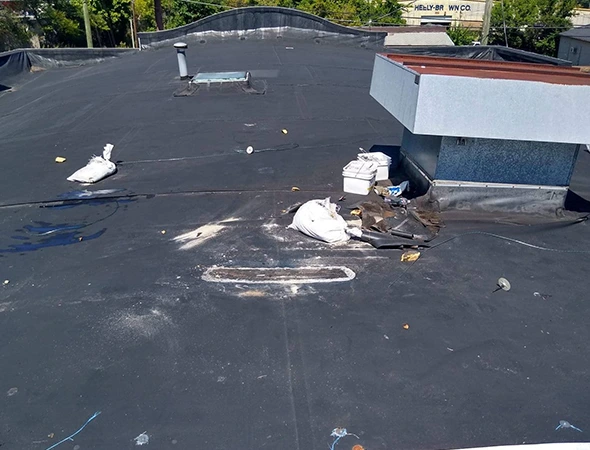 Residential roofing contractors installing durable roofing materials