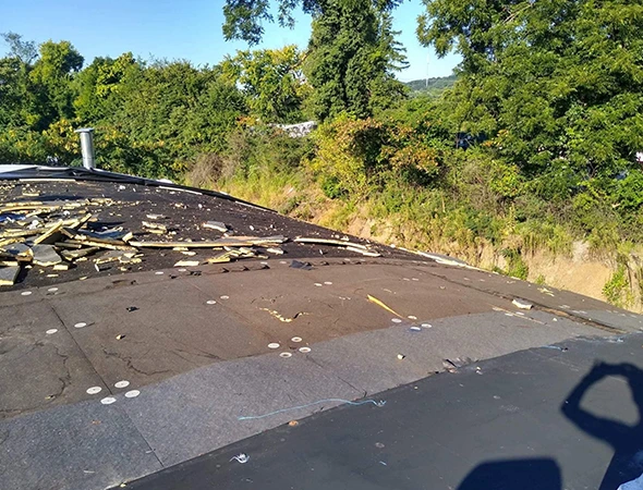 Old roof removal and replacement by experienced local roofing professionals